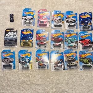 18 Hot Wheels as shown